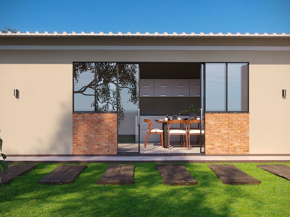 Galería residencial con cerramiento de cristal y perfiles negros